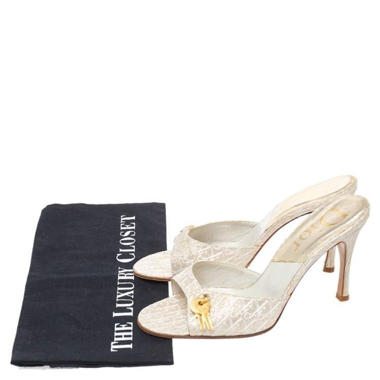 Pre Owned Dior Cream/Gold Diorissimo Canvas Lock And Key Embellished Slide Sandals Size 38.5