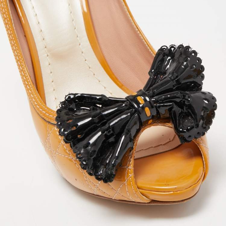 Pre Owned Dior Light Orange/Black Cannage Patent Leather Bow Peep Toe Pumps Size 38.5