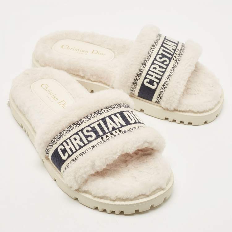 Pre Owned Dior White/Navy Blue Shearling Fur and Logo Canvas Dway Flat Slides Size 38