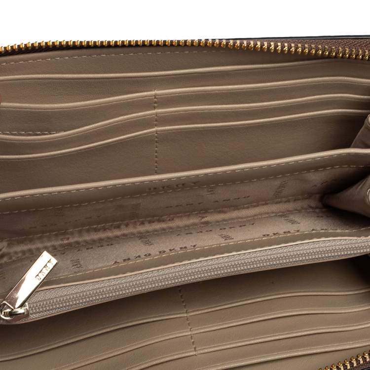 Pre Owned Dkny Brown Signature Coated Canvas Whitney Zip Around Wallet