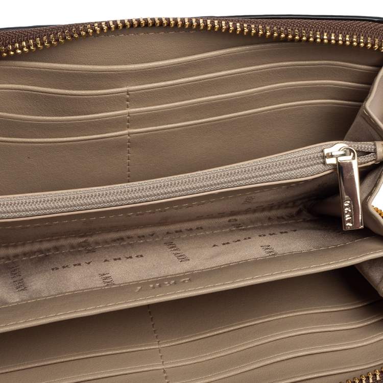 Pre Owned Dkny Brown Signature Coated Canvas Whitney Zip Around Wallet