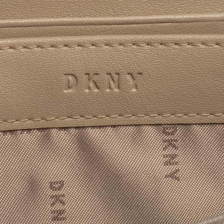 Pre Owned Dkny Brown Signature Coated Canvas Whitney Zip Around Wallet