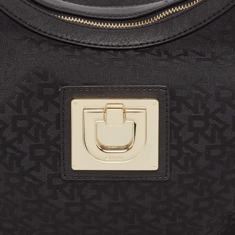 Pre Owned Dkny Black Monogram Canvas and Leather Zip Hobo