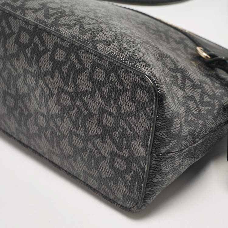 Pre Owned Dkny Black Monogram Coated Canvas and Leather Dome Crossbody Bag