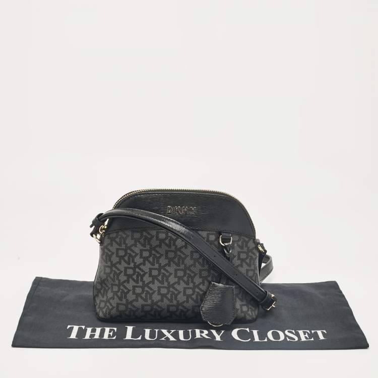 Pre Owned Dkny Black Monogram Coated Canvas and Leather Dome Crossbody Bag