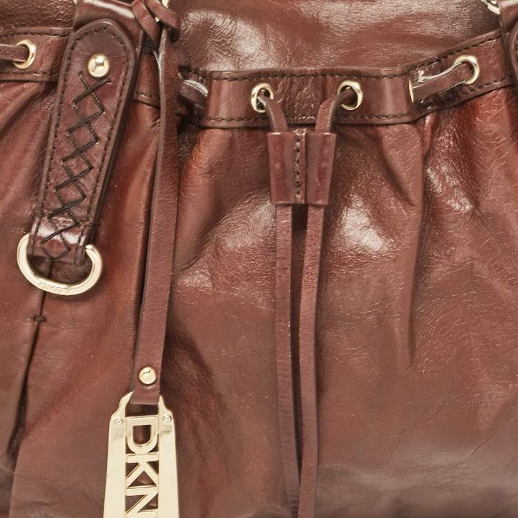 Pre Owned DKNY Dark Brown Leather Studded Drawstring Tote