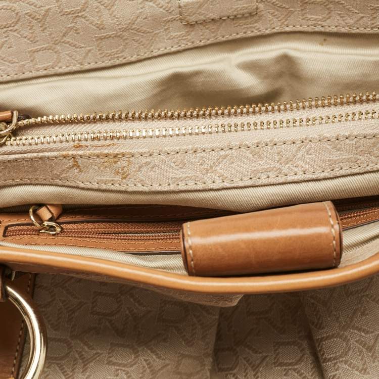 Pre Owned DKNY Beige/Brown Monogram Canvas and Leather Front Zip Tote