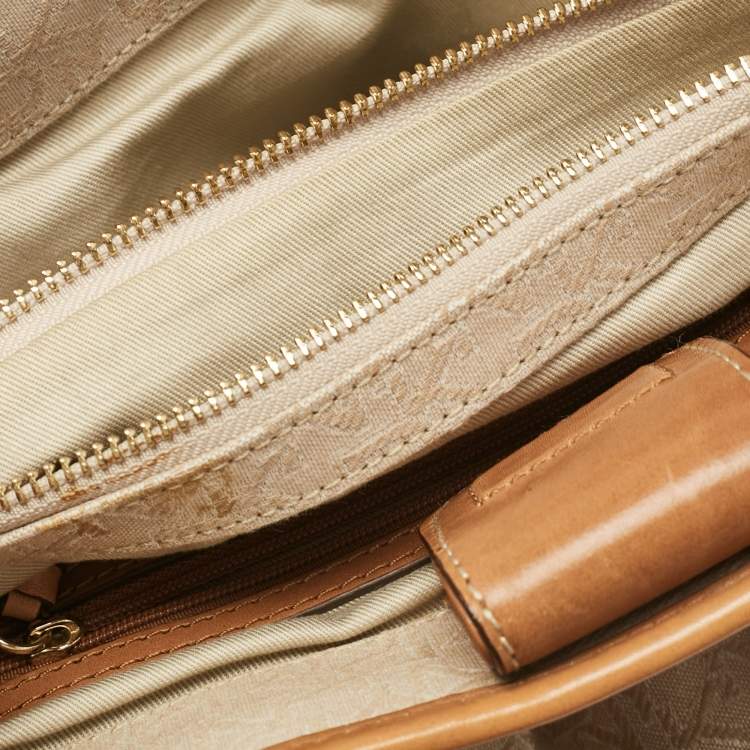 Pre Owned DKNY Beige/Brown Monogram Canvas and Leather Front Zip Tote