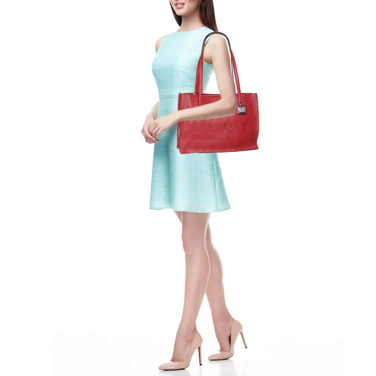 Pre Owned Dkny Red Leather Logo Embossed Tote