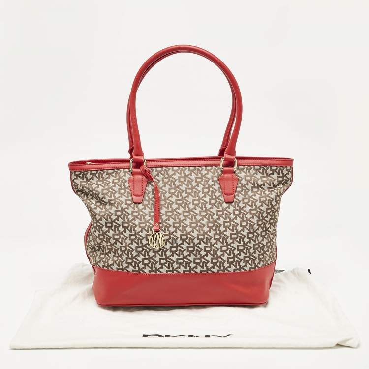 Pre Owned DKNY Red/Beige Signature Canvas and Leather Zip Tote