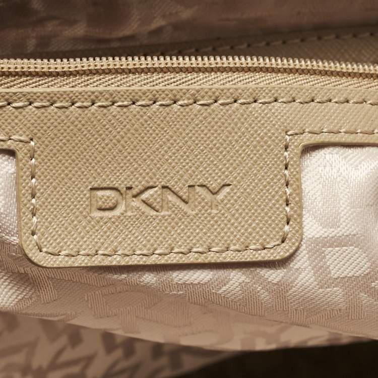 Pre Owned DKNY Red/Beige Signature Canvas and Leather Zip Tote