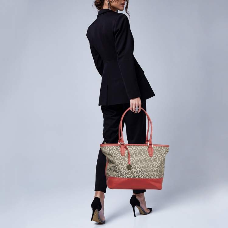 Pre Owned DKNY Red/Beige Signature Canvas and Leather Zip Tote