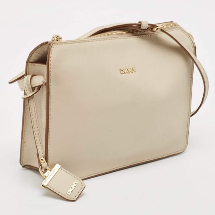 Pre Owned DKNY Off White Leather Bryant Zip Crossbody Bag 
