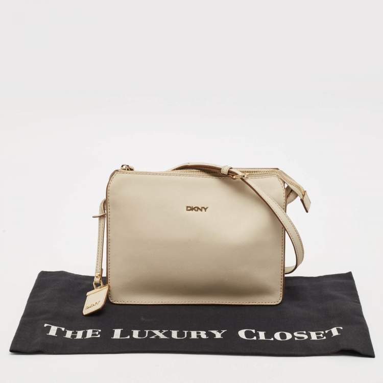 Pre Owned DKNY Off White Leather Bryant Zip Crossbody Bag 