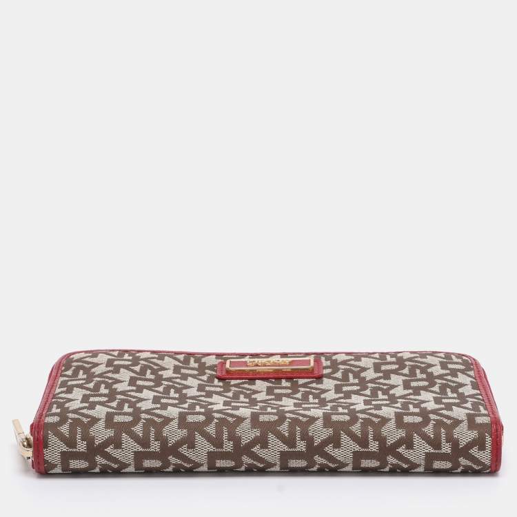 Pre Owned DKNY Beige/Red Canvas and Leather Zip Around Wallet