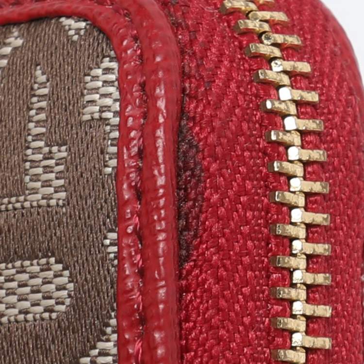 Pre Owned DKNY Beige/Red Canvas and Leather Zip Around Wallet