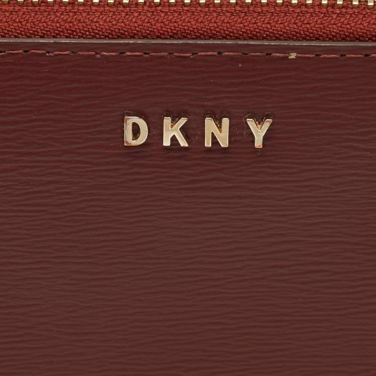 Pre Owned DKNY Burgundy Leather Bryant Zip Around Compact Wallet