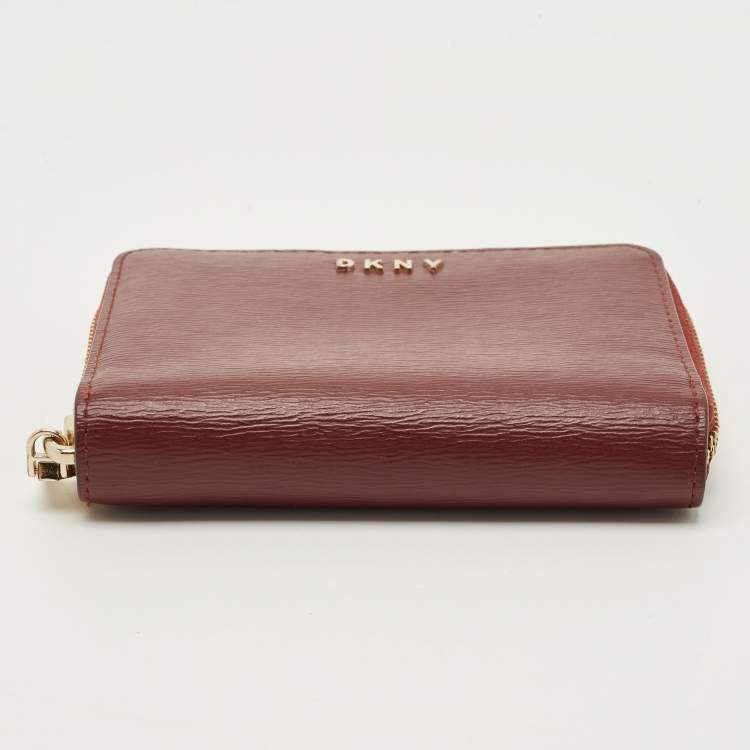 Pre Owned DKNY Burgundy Leather Bryant Zip Around Compact Wallet