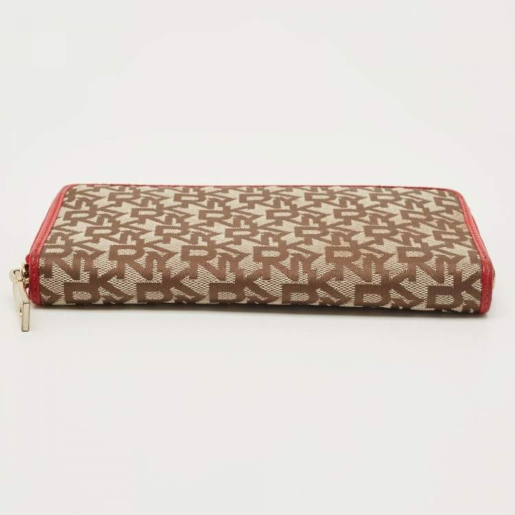 مملوكة مسبقًا Dkny Beige/Red Monogram Fabric Zip Continental Wallet