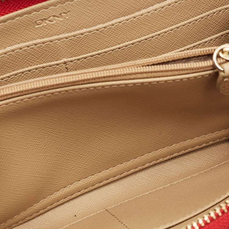 مملوكة مسبقًا Dkny Beige/Red Monogram Fabric Zip Continental Wallet