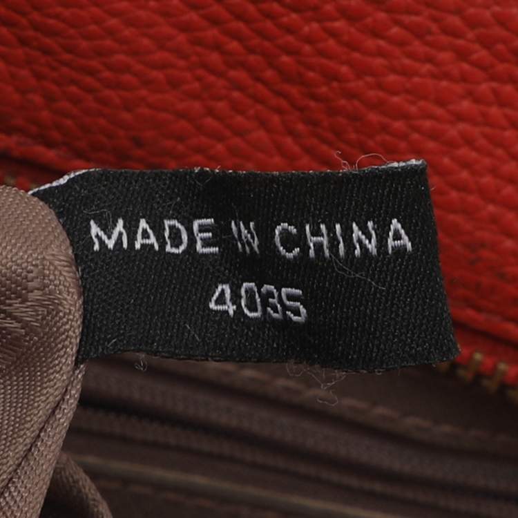 Pre Owned Dkny Chelsea Orange Leather Crossbody Bag