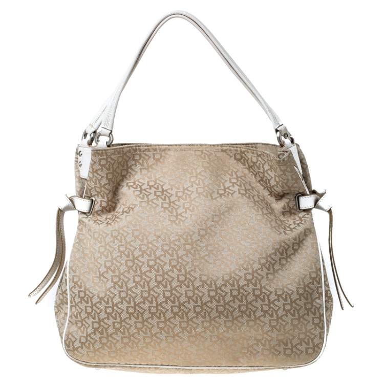 مملوكة مسبقًا DKNY Beige/White Signature Canvas and Leather Front Pocket Hobo