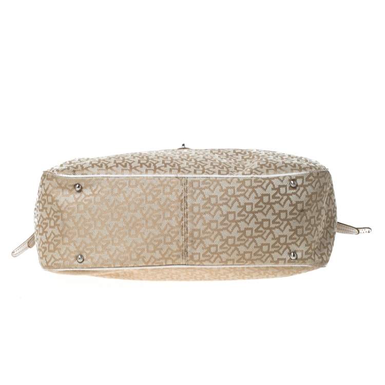 مملوكة مسبقًا DKNY Beige/White Signature Canvas and Leather Front Pocket Hobo