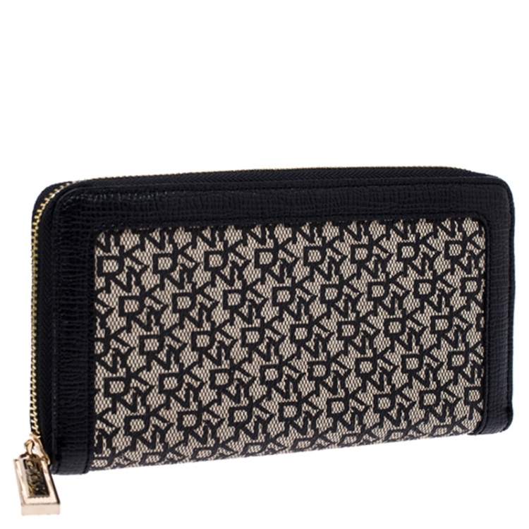 Pre Owned DKNY Beige/Black Canvas and Leather Zip Around Wallet