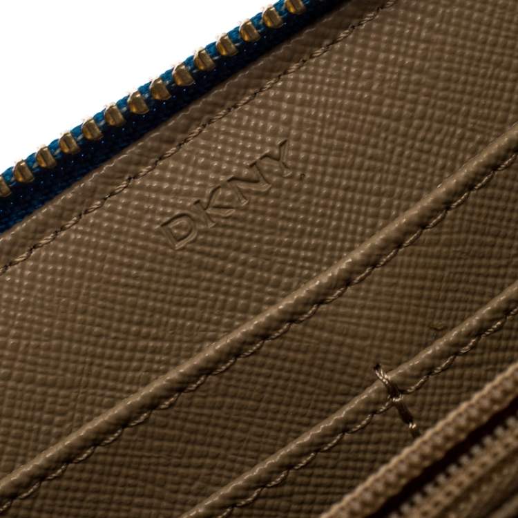 Pre Owned Dkny Beige/Blue Signature Canvas Zip Around Wallet