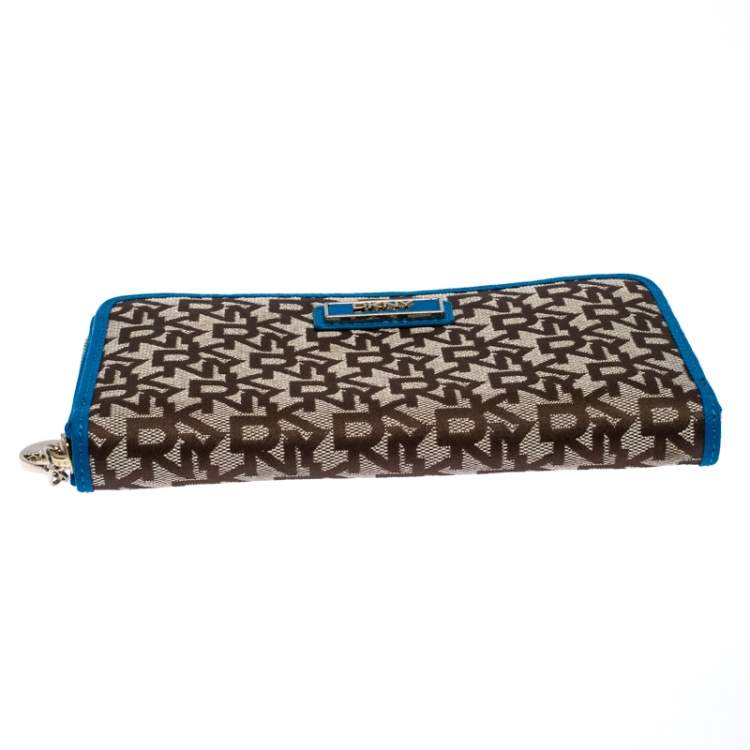 Pre Owned Dkny Beige/Blue Signature Canvas Zip Around Wallet