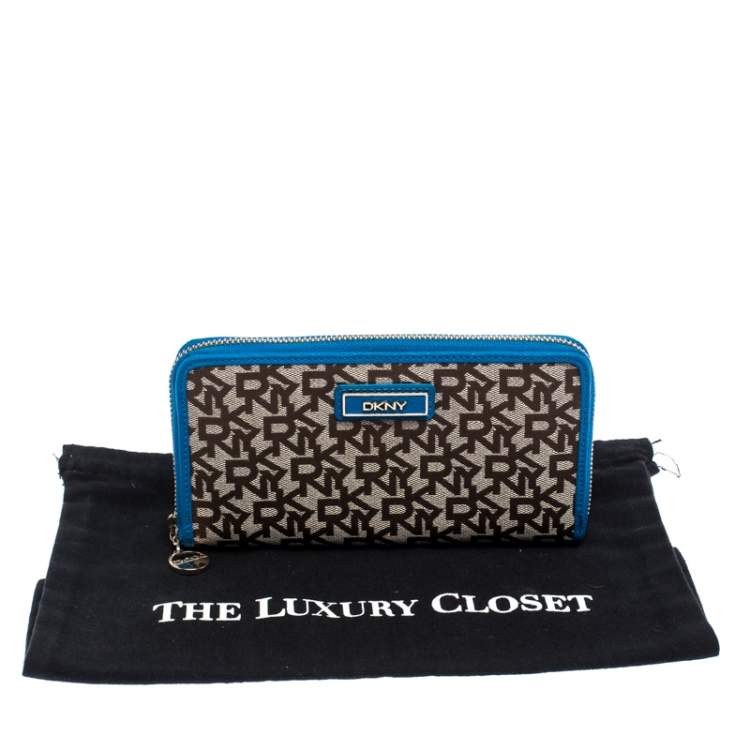 Pre Owned Dkny Beige/Blue Signature Canvas Zip Around Wallet