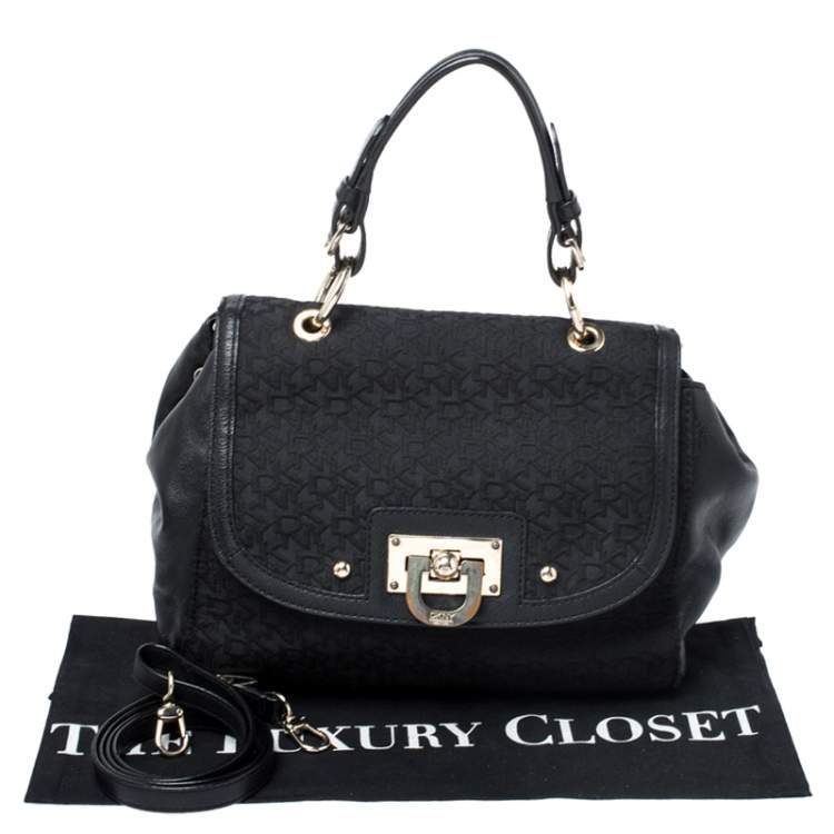 Pre Owned DKNY Black Signature Canvas and Leather Flap Lock Top Handle Bag