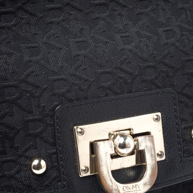 Pre Owned DKNY Black Signature Canvas and Leather Flap Lock Top Handle Bag