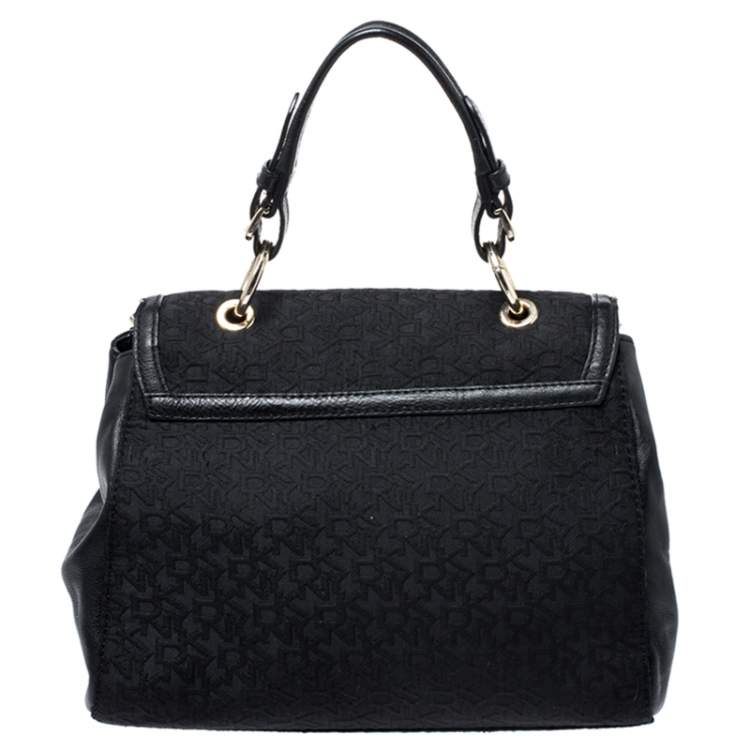Pre Owned DKNY Black Signature Canvas and Leather Flap Lock Top Handle Bag
