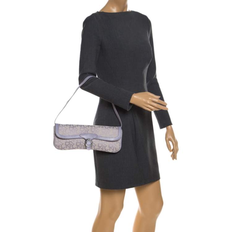 Pre Owned Dkny Lilac Signature Fabric and Leather Buckle Flap Shoulder Bag