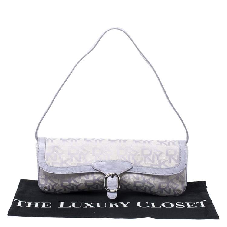 Pre Owned Dkny Lilac Signature Fabric and Leather Buckle Flap Shoulder Bag