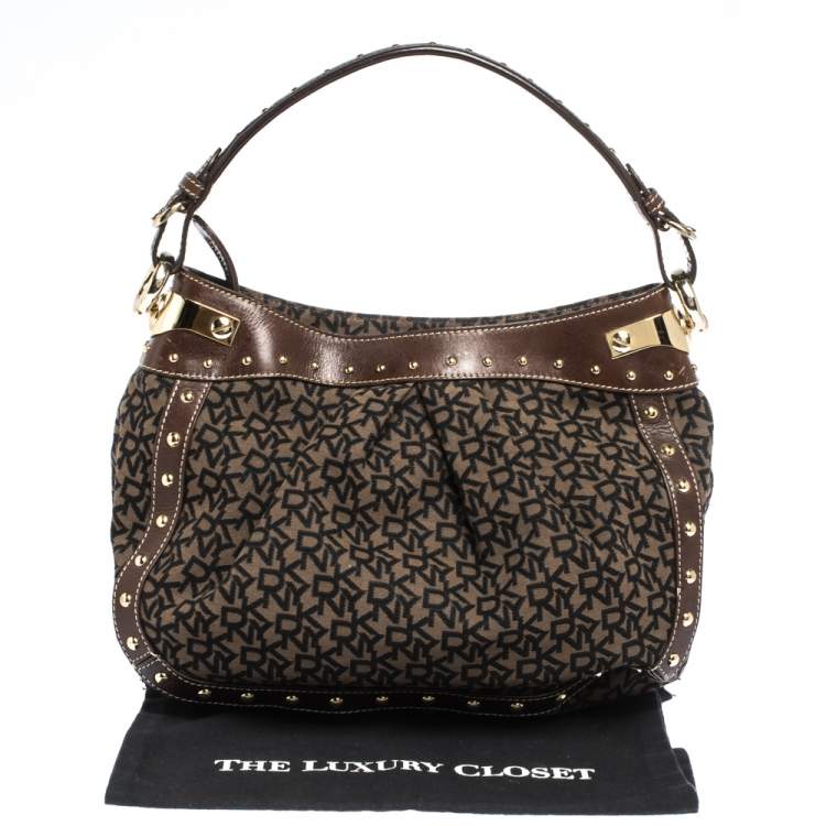 Pre Owned Dkny Brown/Black Signature Canvas and Leather Studded Hobo