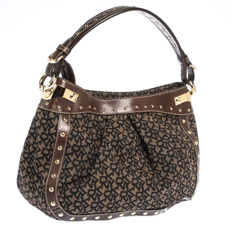 Pre Owned Dkny Brown/Black Signature Canvas and Leather Studded Hobo