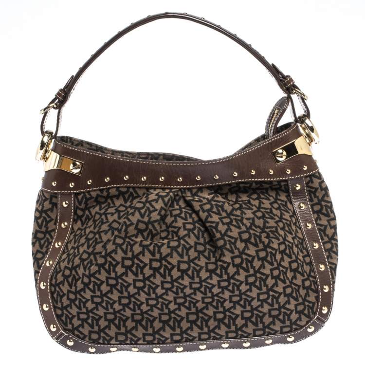 Pre Owned Dkny Brown/Black Signature Canvas and Leather Studded Hobo