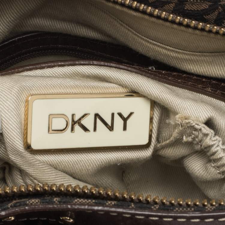 Pre Owned Dkny Brown/Black Signature Canvas and Leather Studded Hobo