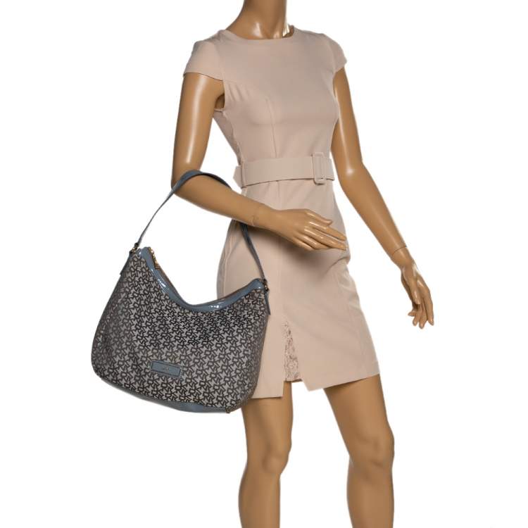 https://cdn.theluxurycloset.com/uploads/opt/products/750x750/luxury-women-dkny-used-handbags-p320919-001.jpg