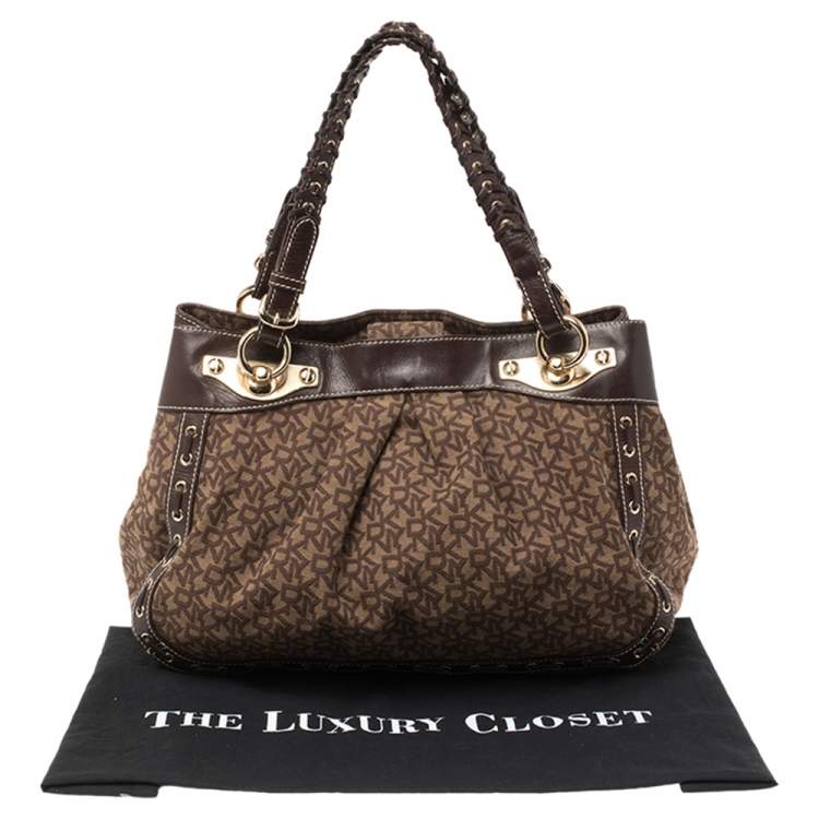Pre Owned Dkny Brown Signature Canvas and Leather Whipstitch Tote