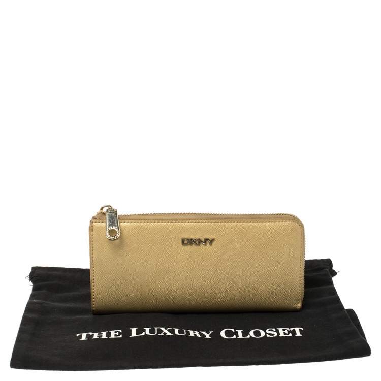 Pre Owned Dkny Metallic Beige Leather Zip Around Wallet