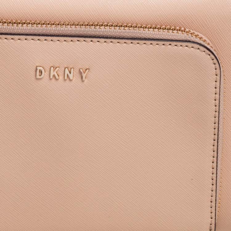 Pre Owned Dkny Beige Leather Small Bryant Park Pocket Crossbody Bag