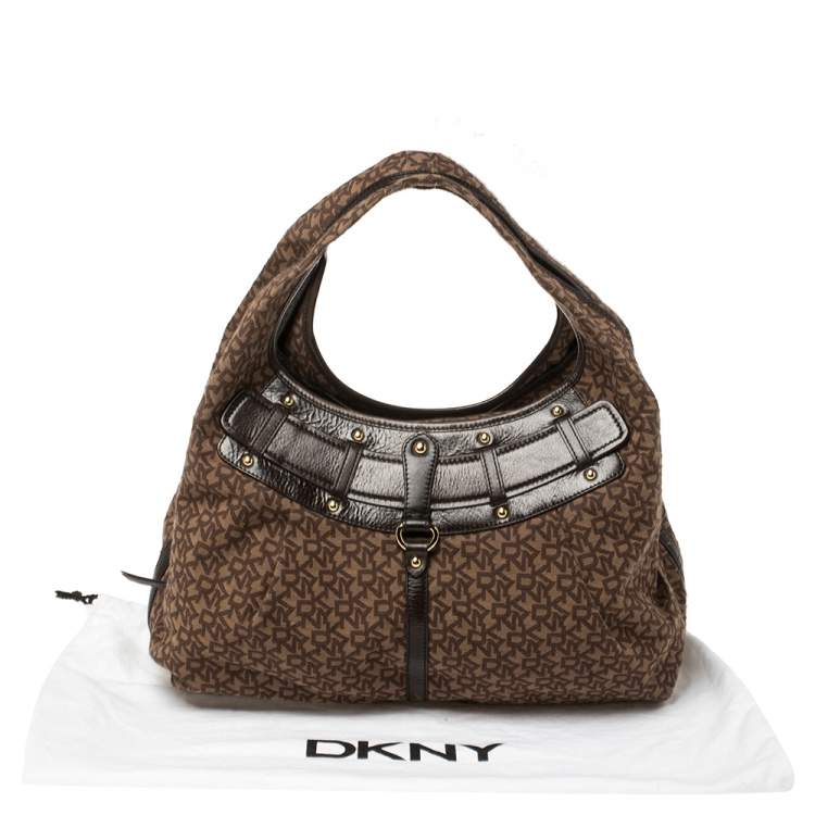 Pre Owned Dkny Brown Monogram Canvas and Leather Studded Hobo