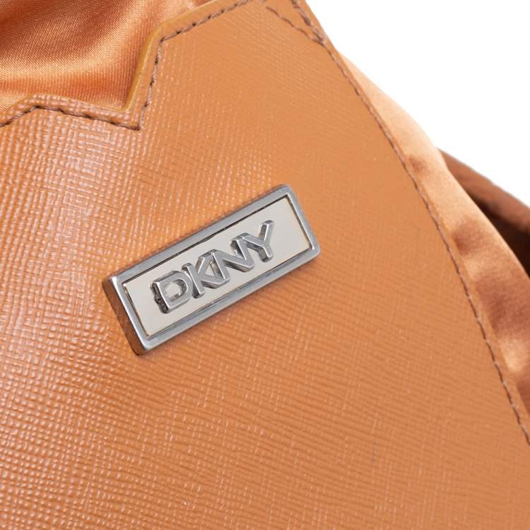Pre Owned DKNY Brown/Beige Signature Canvas and Leather Front Pocket Zip Tote