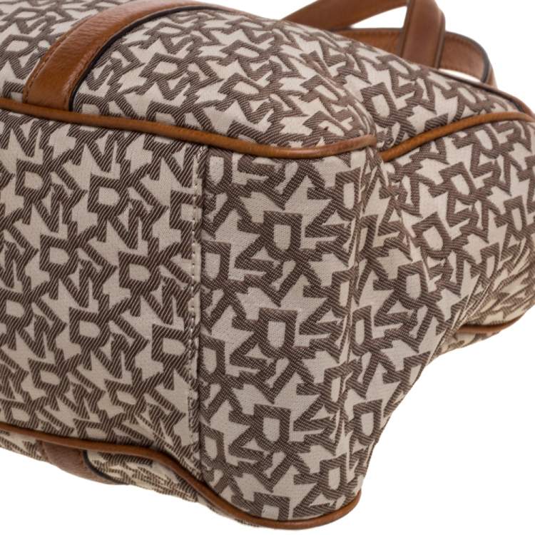 Pre Owned DKNY Brown/Beige Signature Canvas and Leather Front Pocket Zip Tote