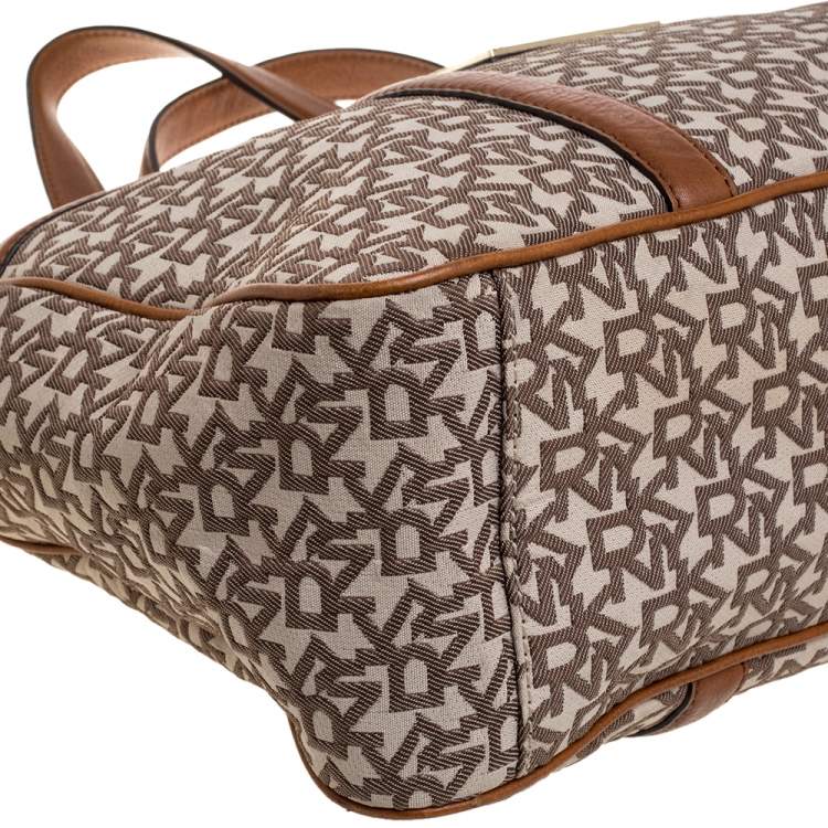 Pre Owned DKNY Brown/Beige Signature Canvas and Leather Front Pocket Zip Tote