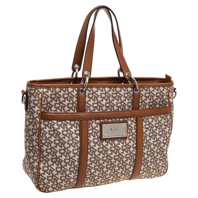 Pre Owned DKNY Brown/Beige Signature Canvas and Leather Front Pocket Zip Tote