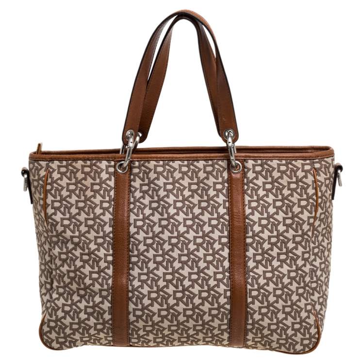 Pre Owned DKNY Brown/Beige Signature Canvas and Leather Front Pocket Zip Tote